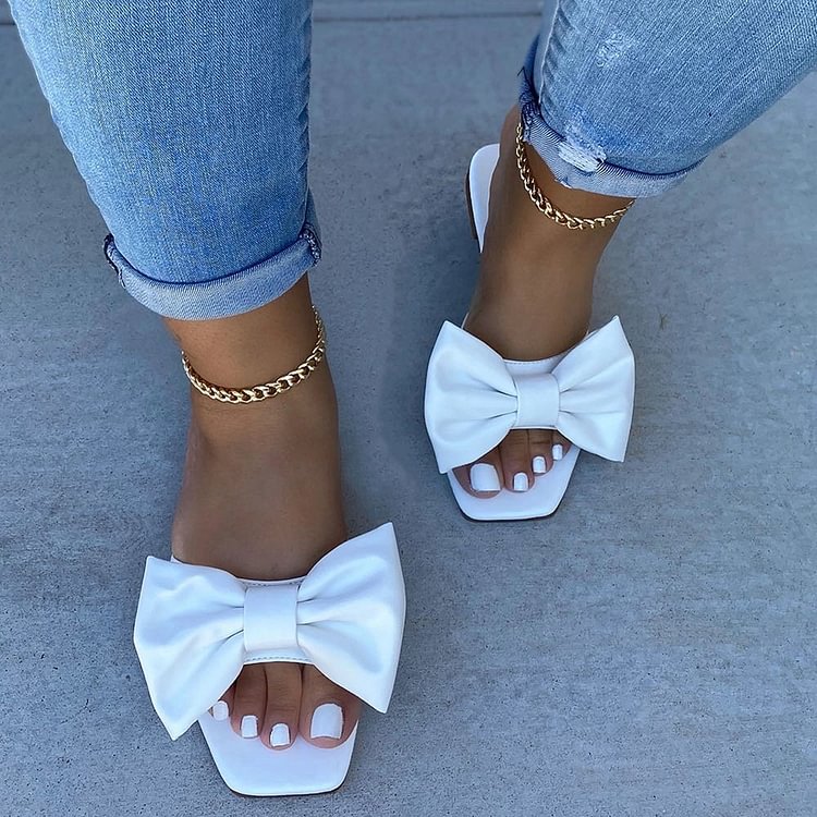 European and American summer foreign trade large size sandals and slippers with bows solid color outer wear flat slippers home shoes