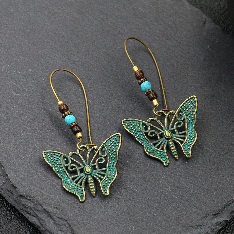 Hollow floral butterfly retro alloy ladies casual earrings