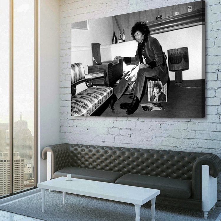 Jimi Hendrix listening to records on Ringo Starr's record player 1960s Canvas Wall Art