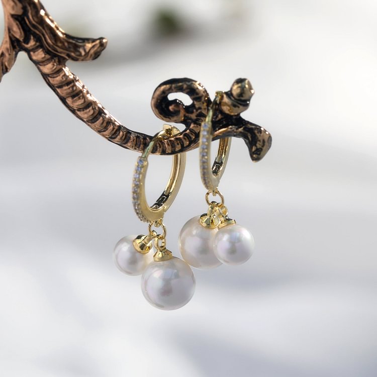 Two Pearl Pendant Metal Earrings