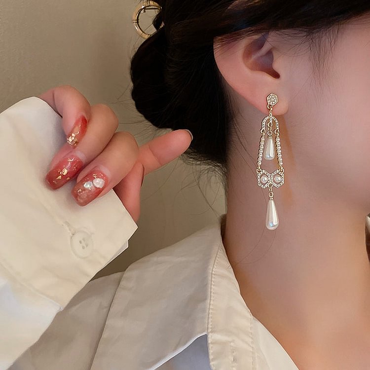 Silver pin and diamond pearl geometric earrings