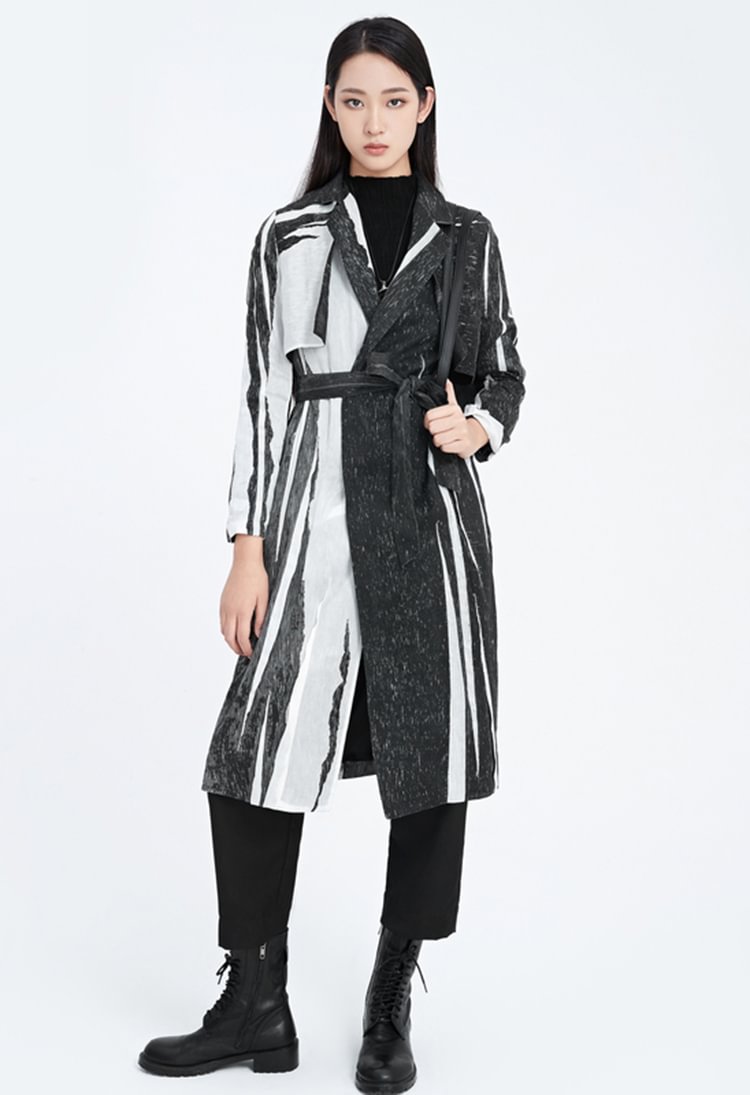 Elegant and feminine ink tie long trench coat