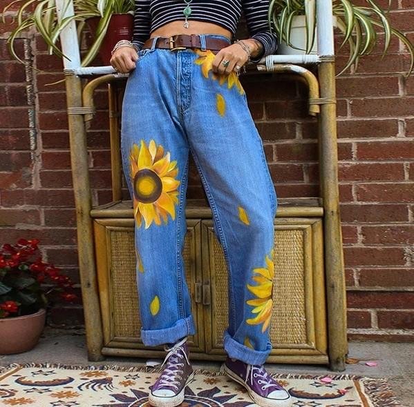Printed washed sun flower denim trousers
