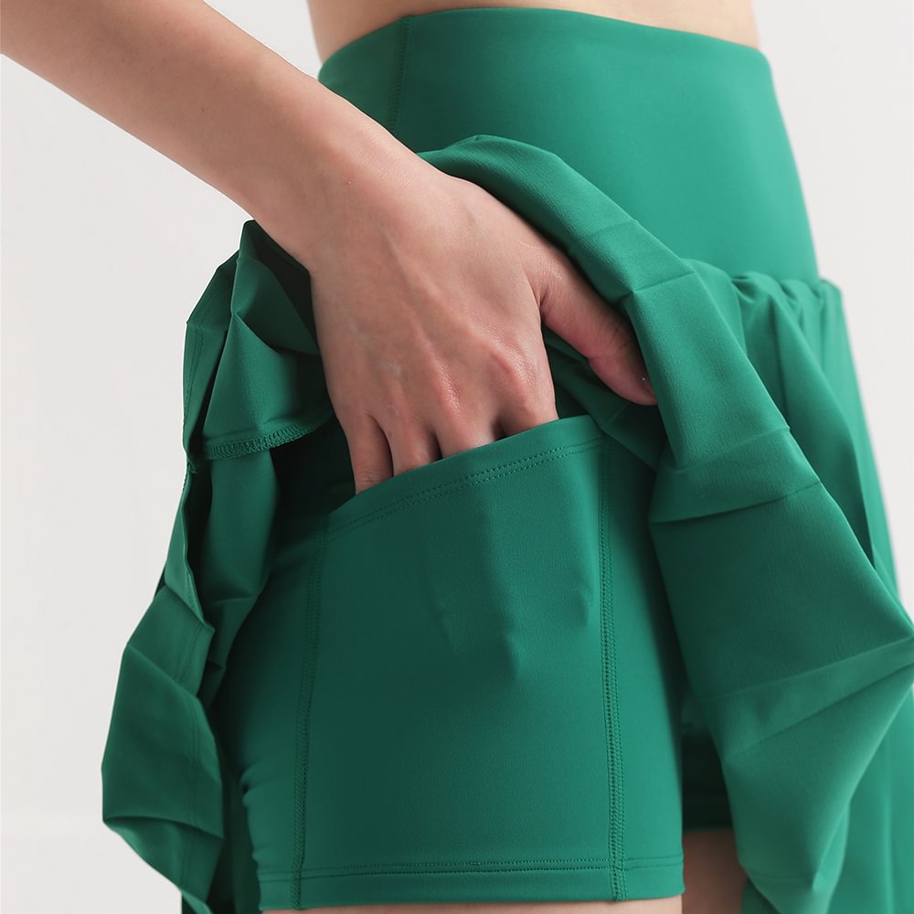 Buy Hergymclothing Green women's pleated sports tennis skirt with lining lycra pockets shorts at an affordable price