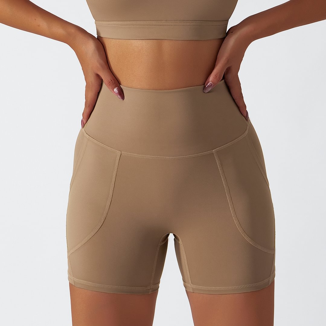 Hergymclothing Camel Brown renewable fabric sustainable no front seam yoga shorts with side pockets for sale
