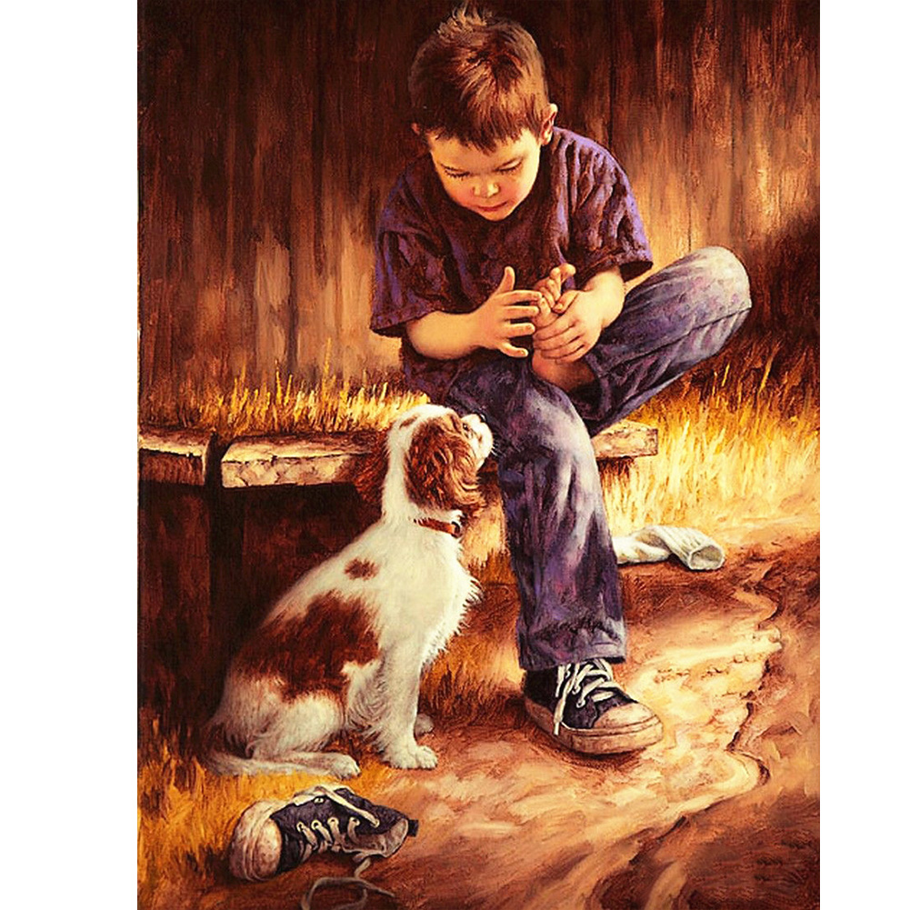 Мальчик играющий с собакой
