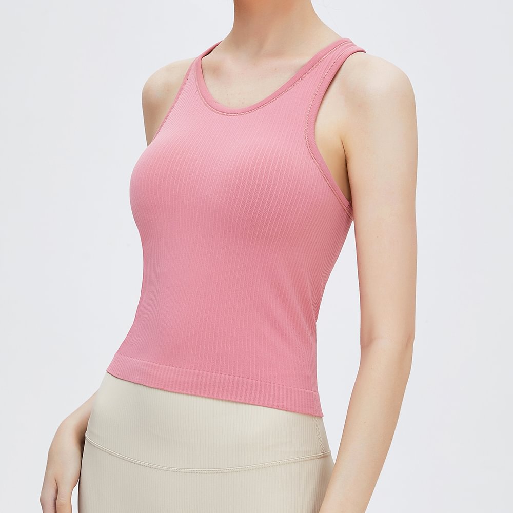Shop quicksand pink seamless ribbed tank top at a great price on Hergymclothing