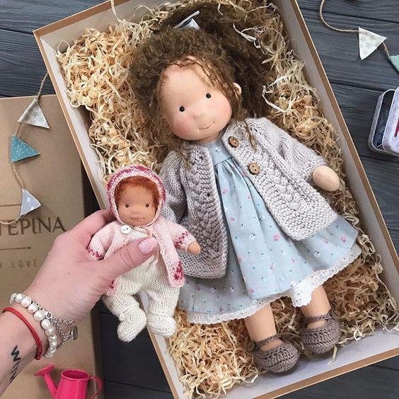 waldorf doll with big set of clothes and accessories